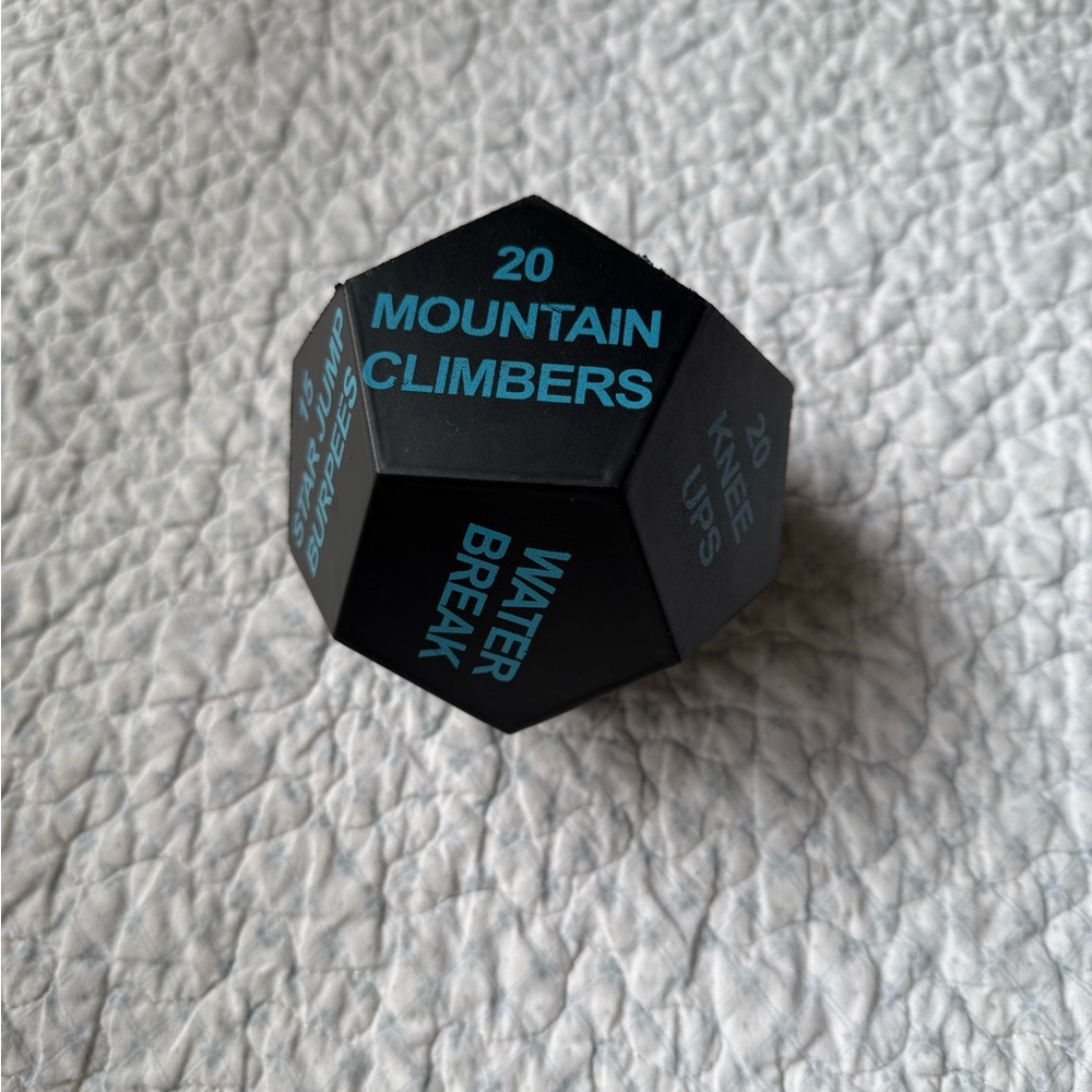 Black Exercise Dice with Blue Text